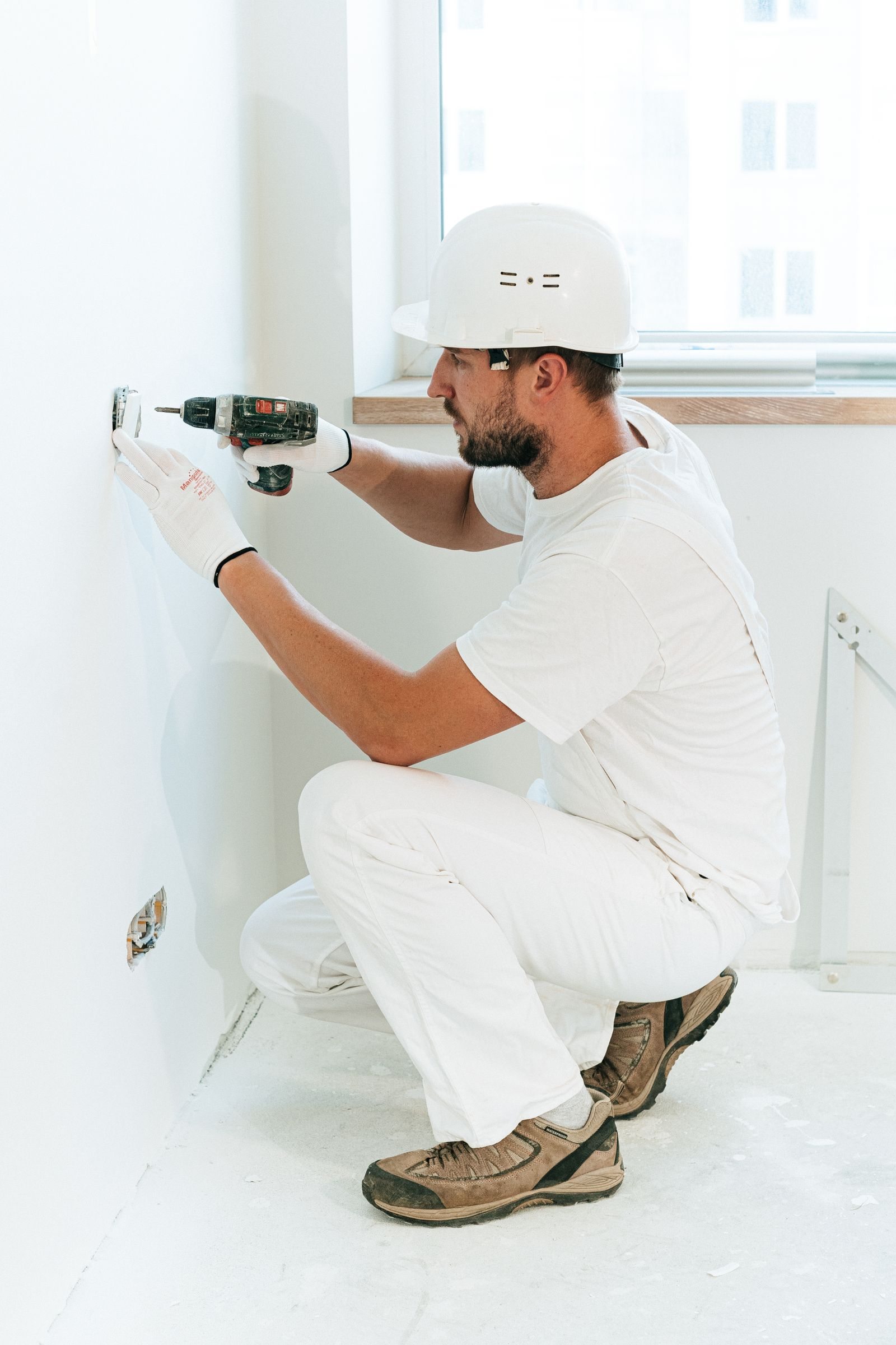 Electrical outlet installation during apartment construction